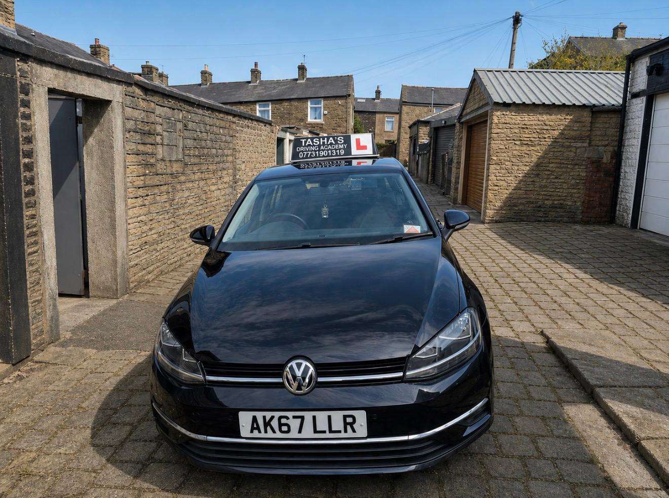 Tasha's driving school car ready for lessons